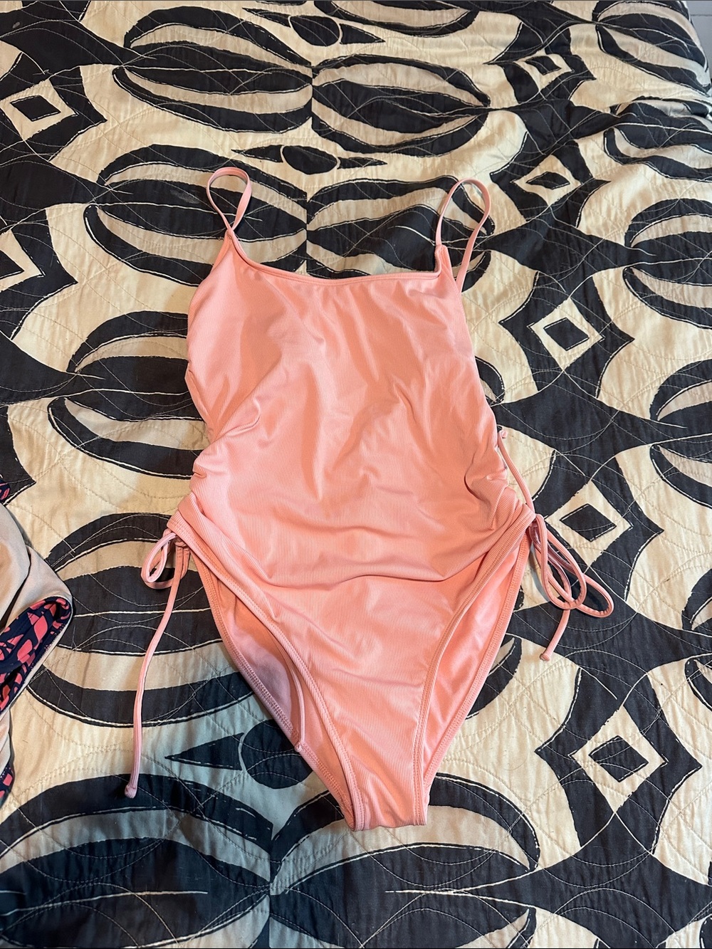 Womens peach One-Piece Swimsuit with adjustable Side Ties